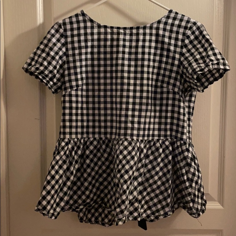 Top with cute bow in the back